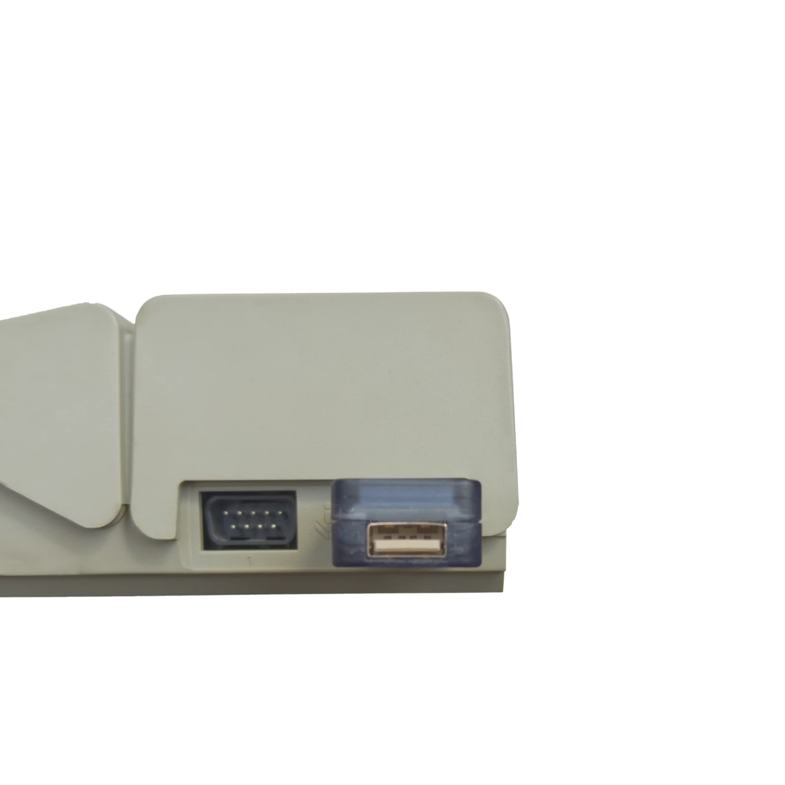 A_Converter_2 - Interactive Mats L-TEK Beige Atari cartridge with two rectangular ports along the bottom edge and a 'MADE FOR ATARI' logo in the top-right corner.
