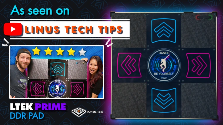 baner_08_05_2026 - Interactive Mats L-TEK YouTube thumbnail with Linus Tech Tips branding, a DDR dance pad setup, and two smiling hosts in neon-lit colors